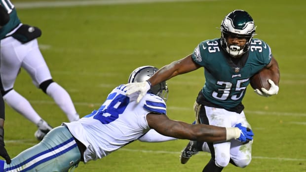Boston Scott runs for some of his 70 yards against the Cowboys on Nov. 1